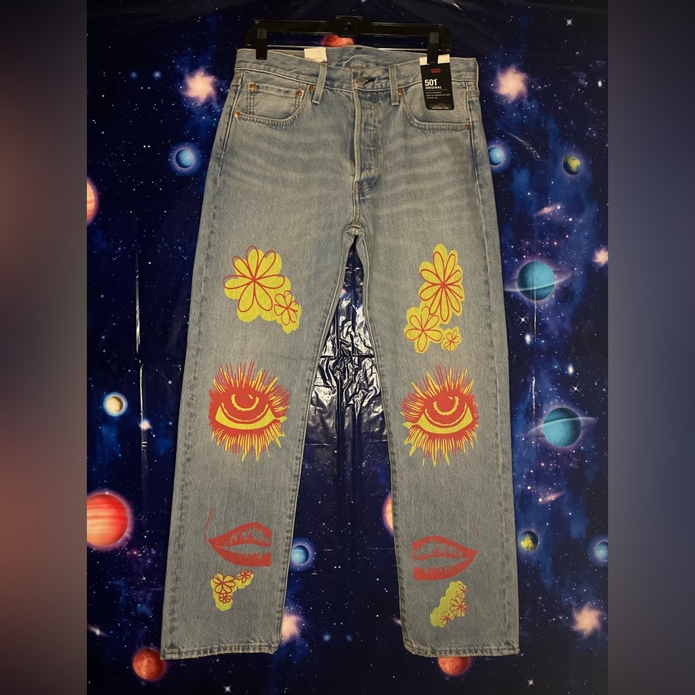 Levi jeans with graphic designs on the front and back